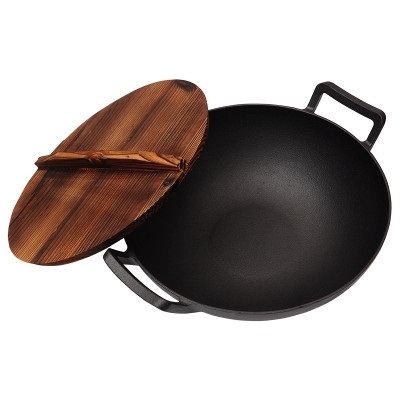 Russian  cast iron wok with vegetable oil coated